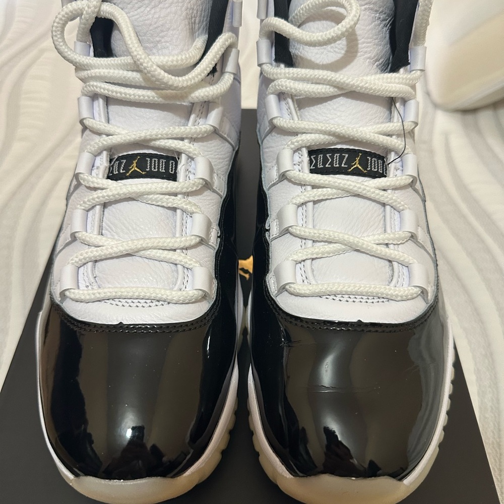 Jordan 11s Mens Black and White Sneakers